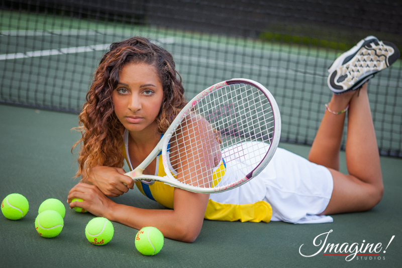 Brianna strikes a serious expression on the tennis court