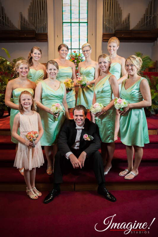 John poses with the bridesmaids