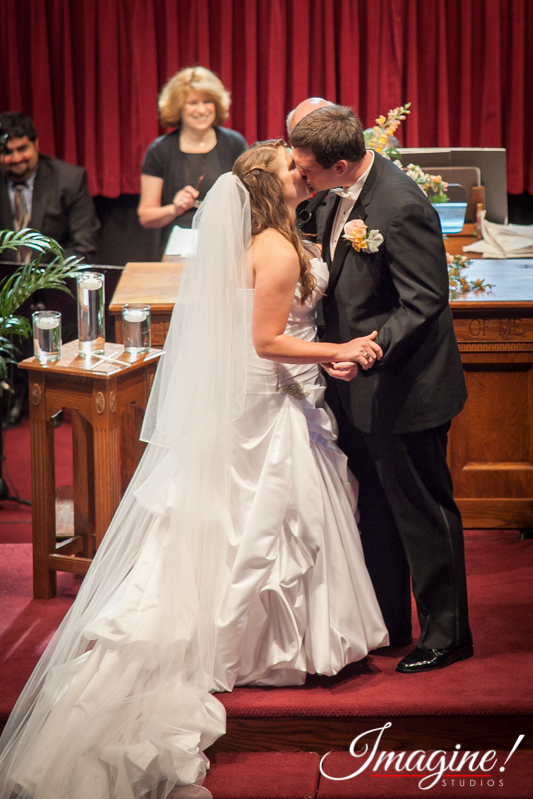 John and Layne share their first kiss as husband and wife