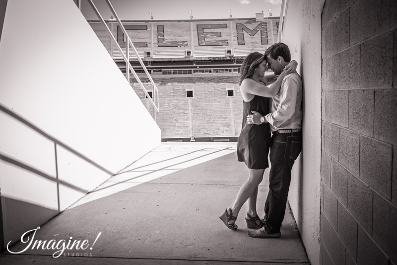 A black and white shot of Brad and Hannah as they share a close moment inside Clemson's Death Valley